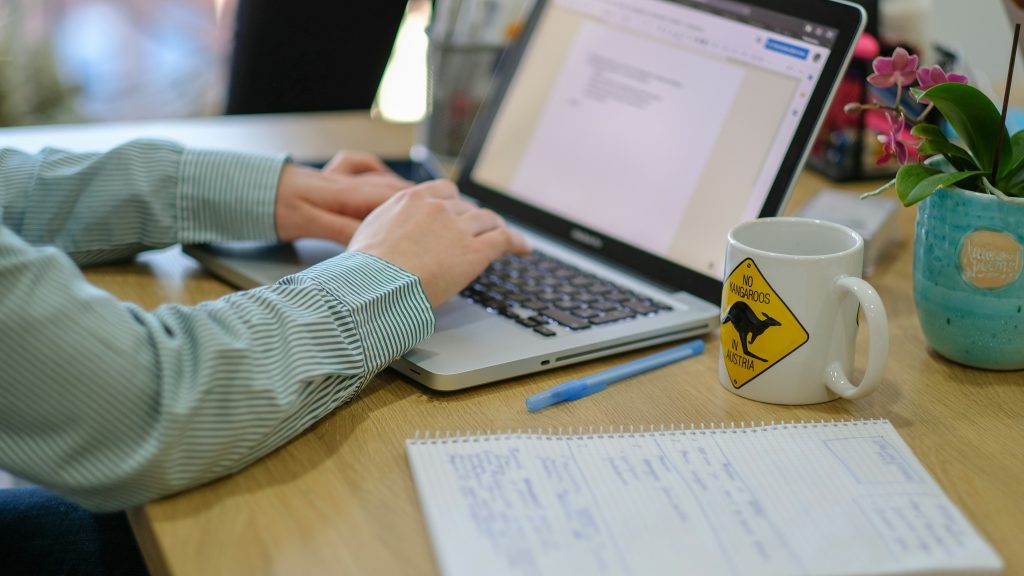 A person working on his computer.