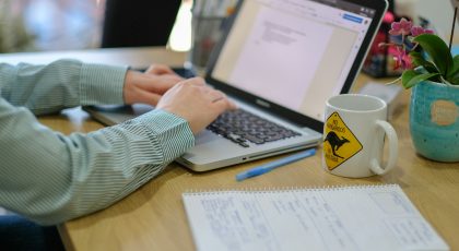 A person working on his computer.