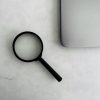 a magnifier glass on a table