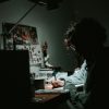A person is on her computer, working.