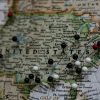 A USA map with pins showing the prominent states and cities.