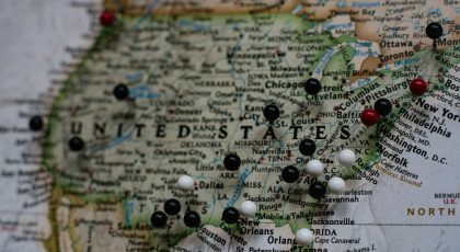 A USA map with pins showing the prominent states and cities.