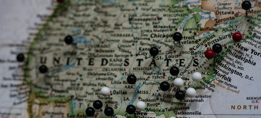 A USA map with pins showing the prominent states and cities.