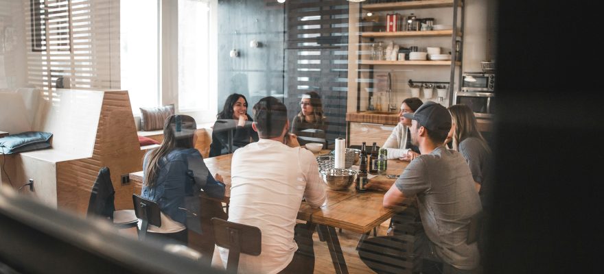 A group of people in a meeting room.